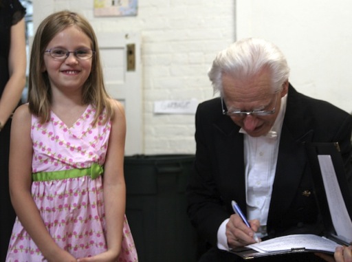 Micaela Sands gets Maestro Pleshakov’s autograph